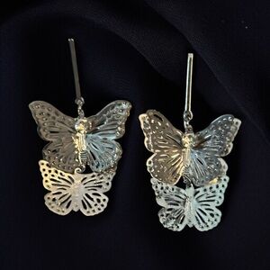 Charlotte & Anna silver tone filigree butterfly dangle earrings